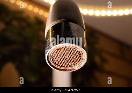 The diffuser in the faucet is clogged and corroded close-up. Old plumbing fixtures in the house Stock Photo