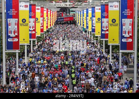 Fans make there way down Wembley waybahead of the Sky Bet League 1 Play-off Final match Barnsley vs Sheffield Wednesday at Wembley Stadium, London, United Kingdom, 29th May 2023  (Photo by Mark Cosgrove/News Images) Stock Photo