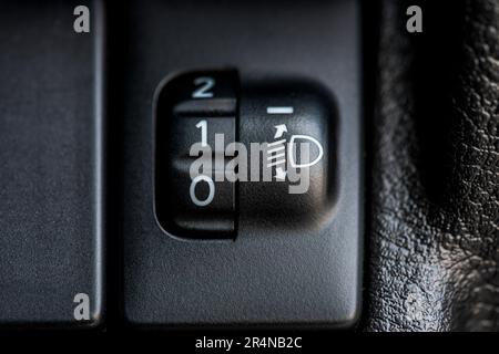 Close-up of the button on a car's interior. Selective focus. Stock Photo