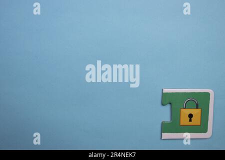 Picture puzzles placed on the edge of the blue background. Lock Stock Photo