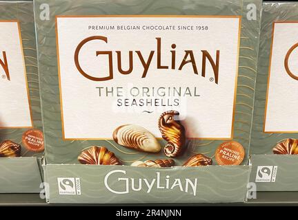 Viersen, Germany - May 9. 2023: Closeup of box belgian chocolate Guylian seashells in shelf of german supermarket Stock Photo