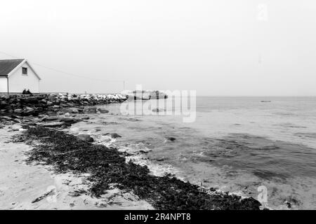 Olberg; Olbergstranden; Raege; Norway; May 20 2023, Black And White Beach Scene With Rocky Outcrops And No People Stock Photo