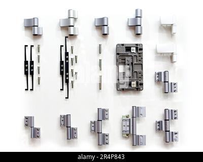 Accessories for doors on bench in shop isolated white Stock Photo