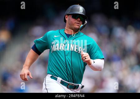 Denver, USA, 21st July 2021. July 1202021: Seattle first baseman Ty France  (23) makes a play during the game with the Seattle Mariners and the  Colorado Rockies held at Coors Field in