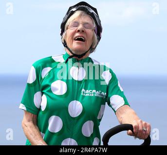 Glasgow, Scotland, UK. 28th May, 2023. Mavis Paterson AKA Granny Mave( 85) arrives at the Mull of Galloway on the final day of her 1000 mile cycle around Scotland trip to raise money for macmillan cancer support. Mavis, who dedicates the challenge to her 3 late children has taken one month to complete the challenge and raised over 55,000.00 pounds for Macmillan. (Credit Image: © Paul Hackett/ZUMA Press Wire) EDITORIAL USAGE ONLY! Not for Commercial USAGE! Stock Photo