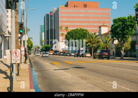 Los Angeles, California, USA - April 26, 2023.   Sunset Boulevard in West Hollywood on a bright sunny day. Architecture, traffic, city life Stock Photo