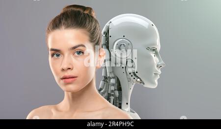Innovations of beauty industry. Young gorgeous lady with perfect face and skin posing to camera with artificial robot Stock Photo