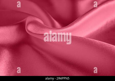 Viva Magenta silk background texture, abstract pattern for design. Sample of the color of the 2023 year. Stock Photo