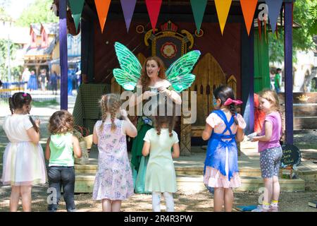 Waxahachie, USA. 29th May, 2023. A woman teaches manners at the Scarborough Renaissance Festival in Waxahachie, on the outskirts of Dallas, Texas, the United States, on May 29, 2023. Credit: Dan Tian/Xinhua/Alamy Live News Stock Photo