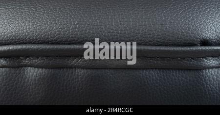 Black leather line with stitches macro close up view Stock Photo