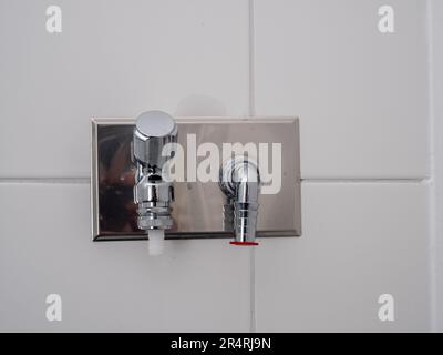 Faucet for connecting the washing machine. Place to install a washing machine. Stock Photo