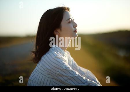 Japanese woman portrait at the beach Stock Photo