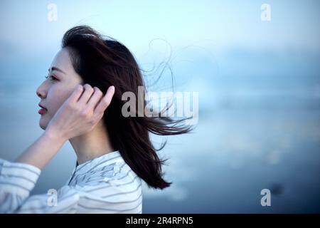 Japanese woman portrait at the beach Stock Photo