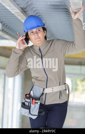 engineer with equipment at construction site Stock Photo