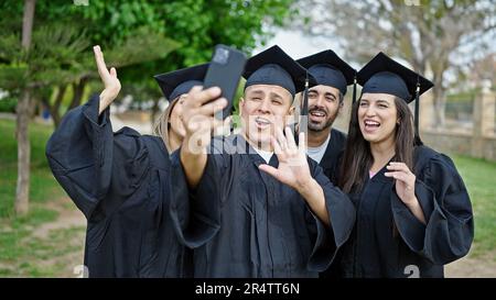 Group of people students graduated having video call at university campus Stock Photo
