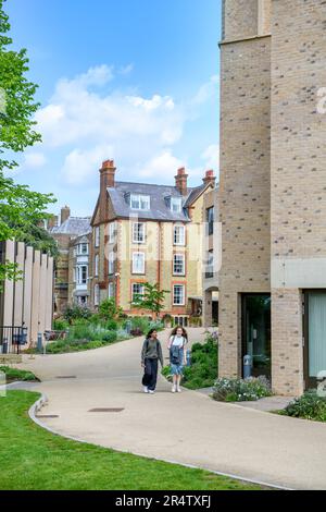 Students by the Anniversary Building (right) at St Hilda's College, Oxford University UK Stock Photo