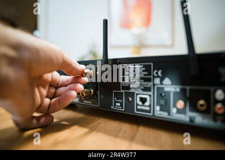 Frankfurt, Germany - Jan 30, 2023: A person unboxing a Pioneer NC