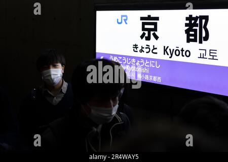 Kyoto, Japan. 7th Mar, 2023. Businessmen, commuters, tourists and visitors alike pass through Kyoto Station, leaving the JR West local platform.Kyoto Station (äº¬éƒ½é§…) is operated by West Japan Railway Company (JR West) and serves as a major hub for rail travel in Kansai. The station is well-connected, offering a wide range of train services, including the high-speed rail Shinkansen bullet trains, local and express trains, as well as the JR Sagano Line and Kintetsu Kyoto Line. It provides convenient access to various destinations within Kyoto prefecture and beyond. The building was designe Stock Photo