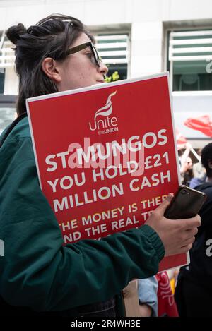 London, UK. 30 May, 2023. Striking workers at the homeless charity St Mungo’s protest outside the charity's headquarters in Tower Hill in a dispute over wages. The workers, members of Unite union, have began a month long strike over low wages having received a below-inflation 2.25% pay offer. Credit: Ron Fassbender/Alamy Live News Stock Photo