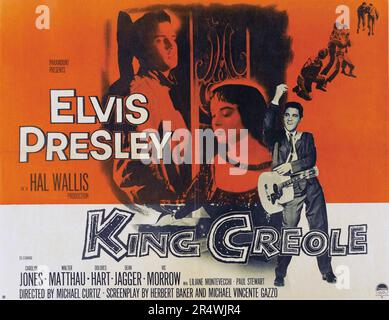 King Creole is a 1958 American musical drama film directed by Michael Curtiz and starring Elvis Presley, Carolyn Jones, and Walter Matthau. It was based on the 1952 novel A Stone for Danny Fisher by Harold Robbins and the film is about a nineteen-year-old who gets mixed up with crooks and involved with two women. Stock Photo