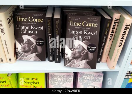 Linton Kwesi Johnson bookcover books 'Time Come' in festival bookstore book shop at Hay Festival 2023 Wales UK Great Britain  KATHY DEWITT Stock Photo