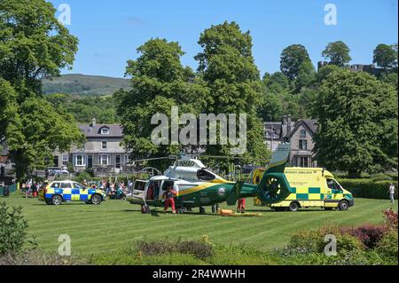 Kirkland, Kendal 30th May 2023 - The North West Air Ambulance landed in Abbot Hall Park after a medical emergency. A witness saw several people performing CPR on a member of public on the nearby Kirkland road. Cumbria Police and Ambulance Services attended the patient within the park, close to a children's playground. A spokesperson for North West Ambulance Service said: 'We've responded to a patient who suffered a medical emergency at an address on Kirkland, Kendal following a call at 12.41. They received treatment at the scene and were taken to hospital by road.' Cumbria Police confirmed to Stock Photo