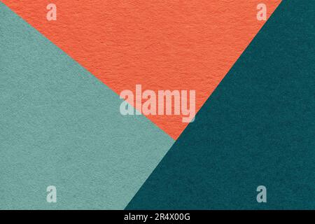 Texture of craft cyan, teal and orange shade color paper background, macro. Structure of vintage abstract cardboard with geometric shape and gradient. Stock Photo
