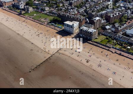 People on Portobello Beach, Edinburgh, enjoying the warm weather on what is believed to be the hottest day so far this year in Scotland. Picture date: Tuesday May 30, 2023. Stock Photo