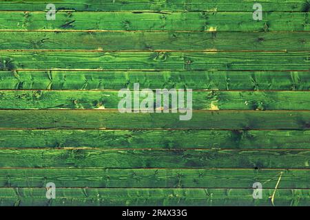 Old green faded retro wooden texture pattern background surface Stock Photo