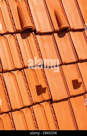 Retro ceramic orange roof tiles pattern background Stock Photo