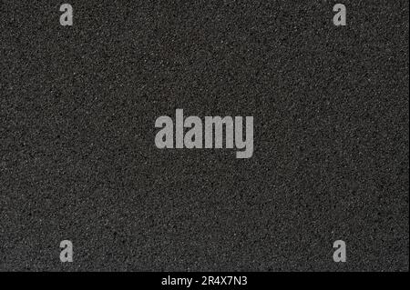 Black rough foam bubble texture background close up view Stock Photo