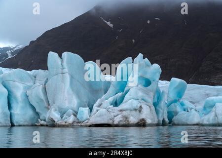 Close-up of the icebergs and blue ice-formations of the Fjallsjokull Glacier viewed from the Fjallsarlon Glacier Lagoon, at the south end of the fa... Stock Photo