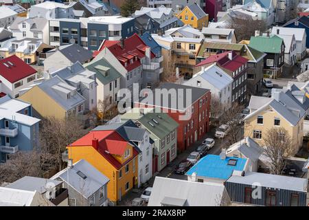 Close-up aerial view of downtown Reykjavík as seen from the top of the church, with brightly colored houses and rooftops creating a beautiful effect Stock Photo