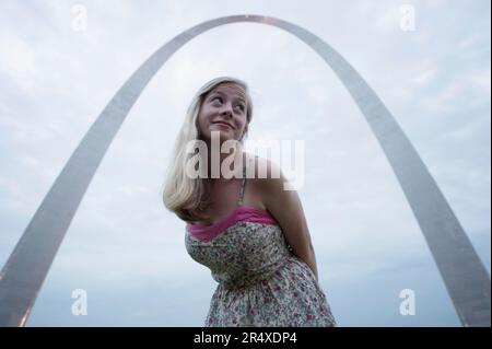 Teenage girl at the Gateway Arch monument in St. Louis, Missouri, USA; St. Louis, Missouri, United States of America Stock Photo