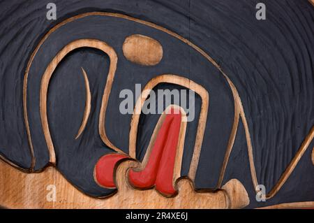 Close-up detail of a totem pole at U'Mista Cultural Center of the Kwakwaka'wakw people, Alert Bay on Cormorant Island, Queen Charlotte Strait, BC, ... Stock Photo