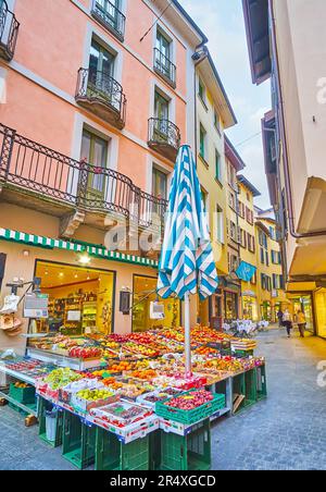 The boxes with fresh fruits in the outdoor stall, located on Via Pessina street in old town of Lugano, Switzerland Stock Photo