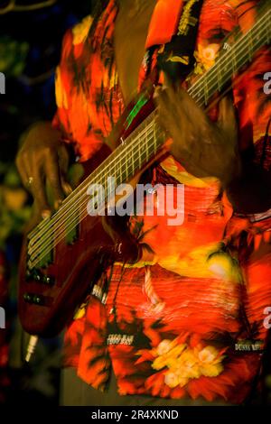 Guitarist playing an electric guitar at a tropical resort; Montego Bay, Jamaica, West Indies Stock Photo