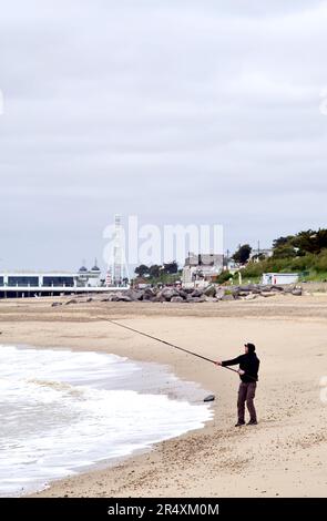 Beach casting on a deserted beach at Clacton on Sea. Stock Photo