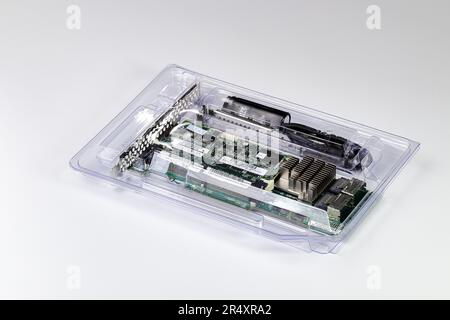 The new disk array controller card ( Raid ) with double mini sas connector in PE package. Stock Photo