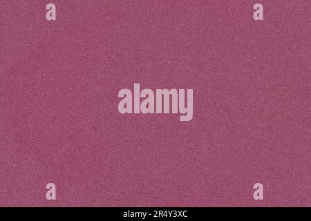 Dark pink cardboard structured paper, seamless tile texture, image width 20cm Stock Photo