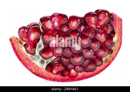 Shiny pomegranate slice isolated on white background Stock Photo