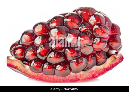 Shiny pomegranate slice isolated on white background Stock Photo