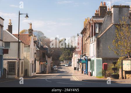 Charming and quaint high street of historic village of Aberdour, Burntisland in Fife, Scotland, UK on a sunny spring day. Stock Photo