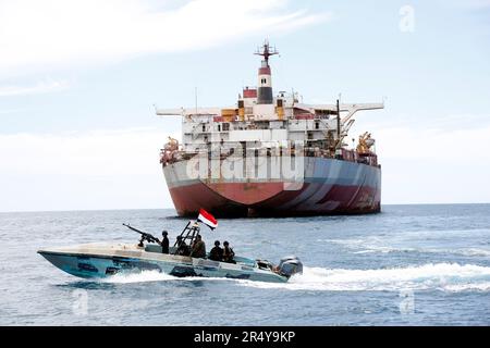 Hodeidah, Yemen. 30th May, 2023. A Yemen's coast guard boat sails past the FSO Safer vessel at Ras Issa port in Hodeidah province, Yemen, on May 30, 2023. A United Nations (UN) ship arrived on Tuesday at the site of the floating storage and offloading (FSO) Safer vessel, a decaying super oil tanker, off the coast of Ras Issa, Hodeidah in western Yemen. Credit: Mohammed Mohammed/Xinhua/Alamy Live News Stock Photo