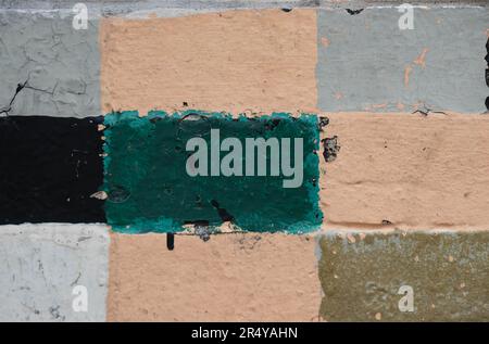 Painted rectangles on brick wall Stock Photo