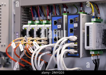 Industrial rack mounted network equipment close up. Selective focus. Stock Photo
