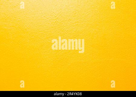 Gold painted on cement and concrete texture for pattern and background. Stock Photo