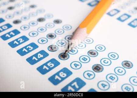 Pencil on answer sheet, closeup. Student passing exam Stock Photo