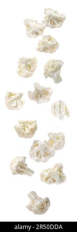 Many fresh cauliflower florets falling on white background Stock Photo