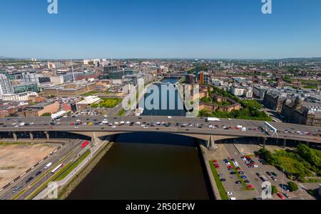 Aerial view from drone of Glasgow city centre skyline along River Clyde  at Kingston Bridge, Scotland, UK Stock Photo